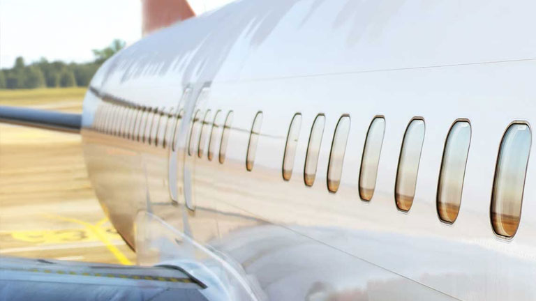 The windows along the side of an airplane