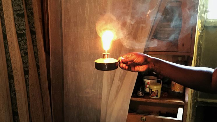 A kerosene lamp burning indoors